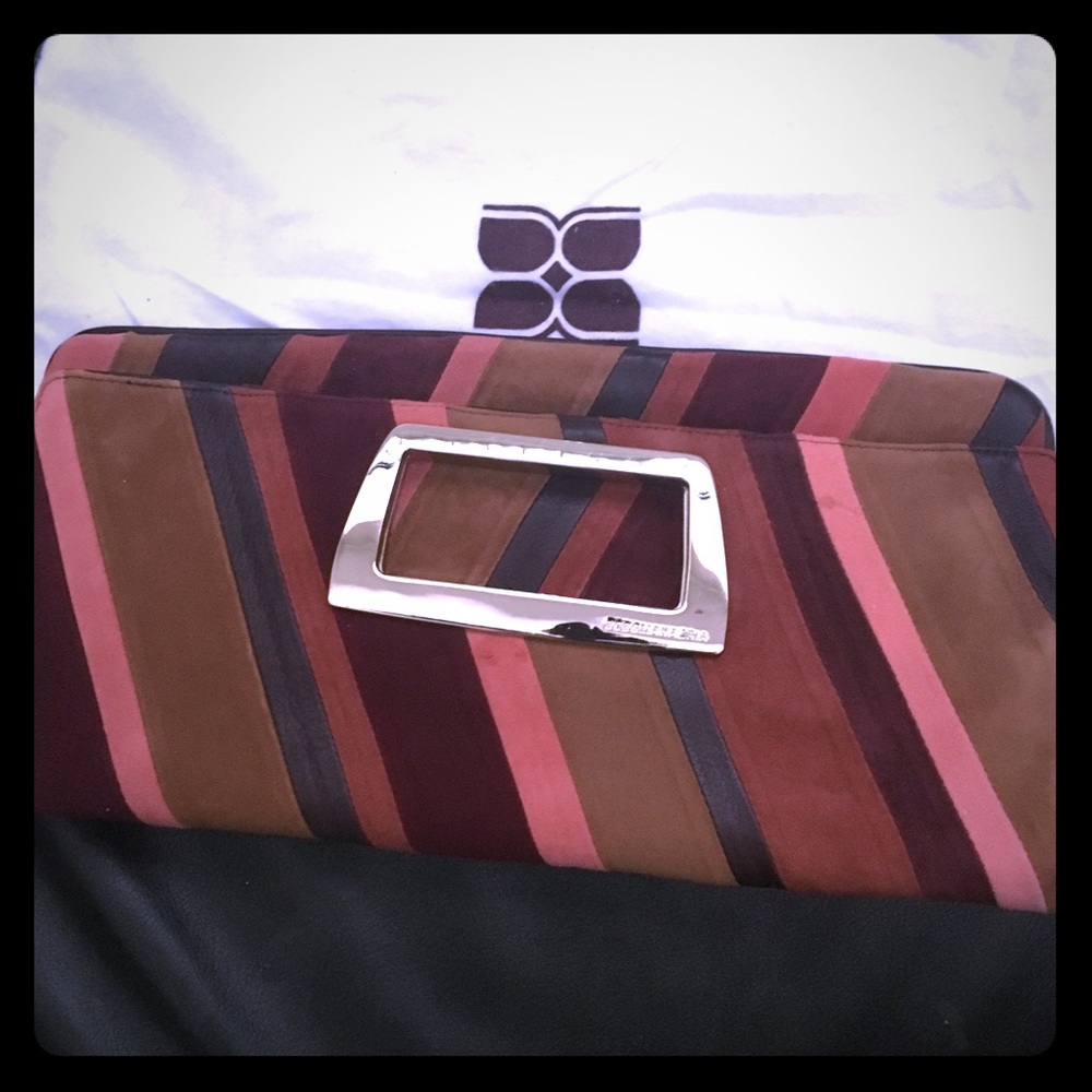 NWOT BCBG clutch, excellent condition, 14”x7”